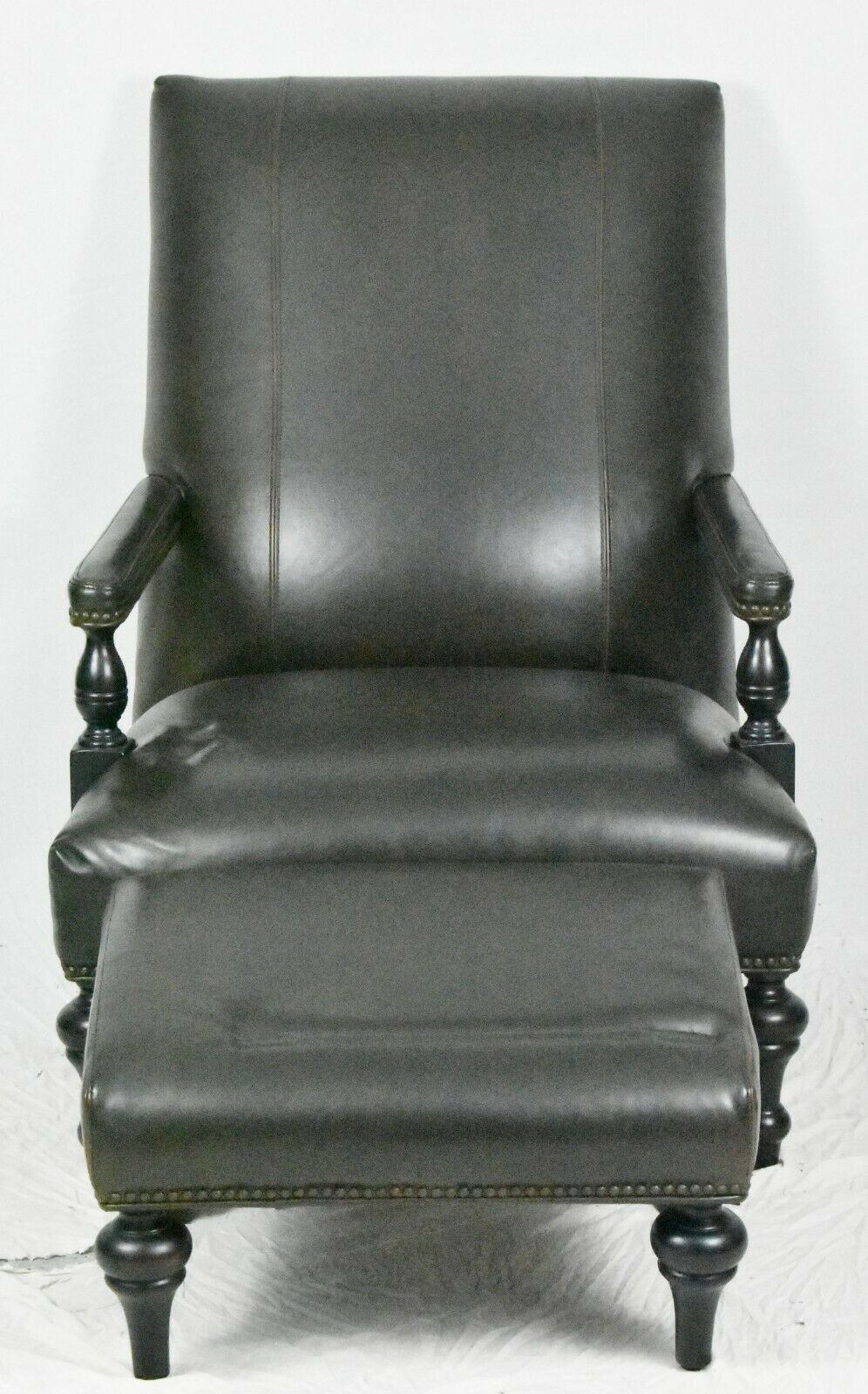 Dark Brown Leather club chair & Ottoman with Nail head trim