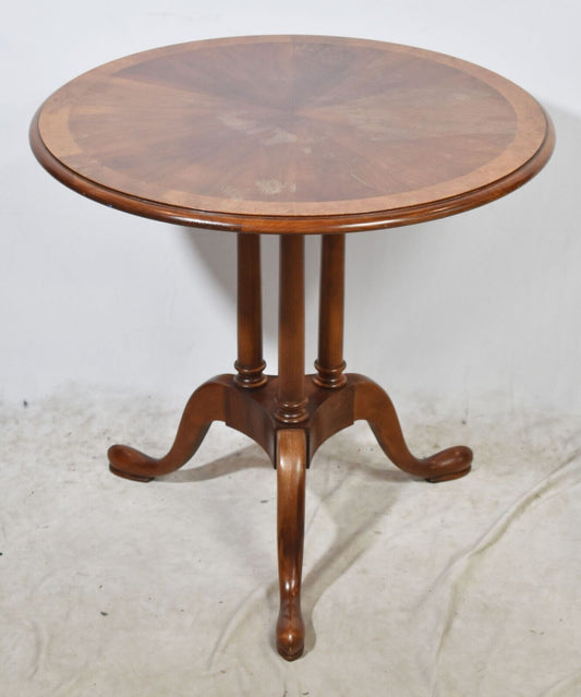 Baker Mahogany Banded Oval Three Column Base Occasional Table